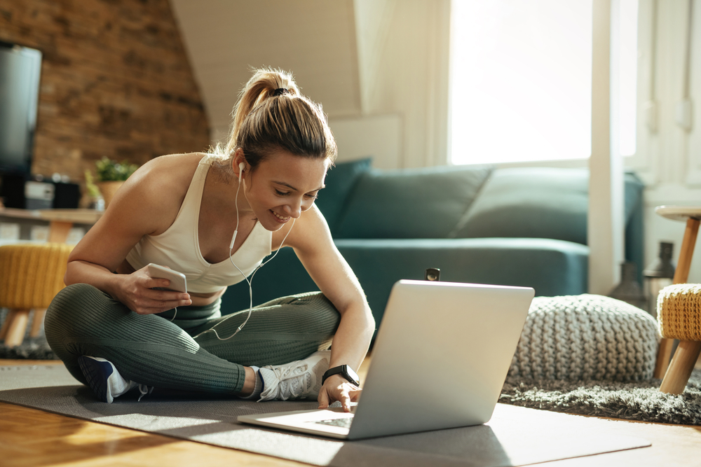 Yoga student on laptop Yoga student on laptop